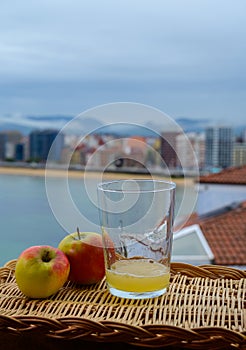 Traditional natural Asturian cider made fromÂ fermented apples in wooden barrels should be poured from great height for air